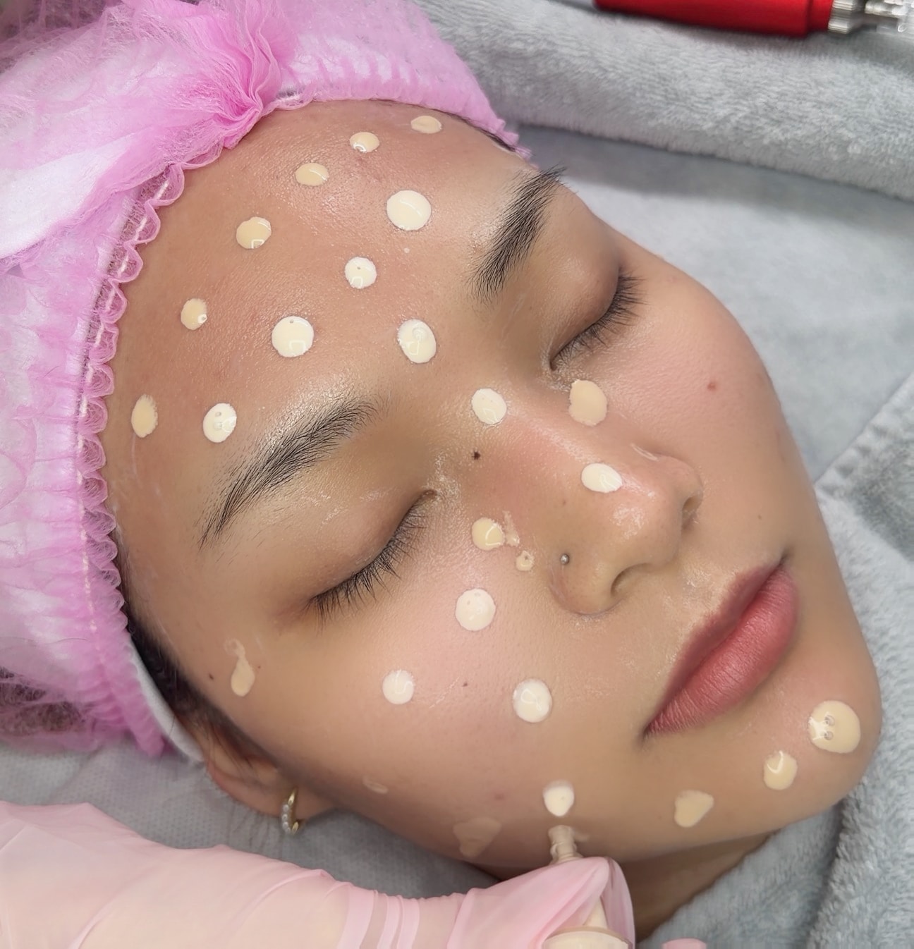 Precision lash extension application at The Rich Brow